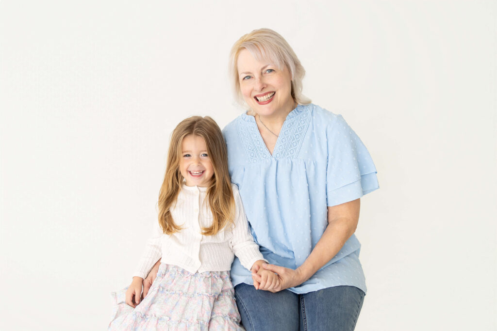Heirloom studio portrait of three generations of family photographed by Jacksonville family photographer Tracy Lynn Photography